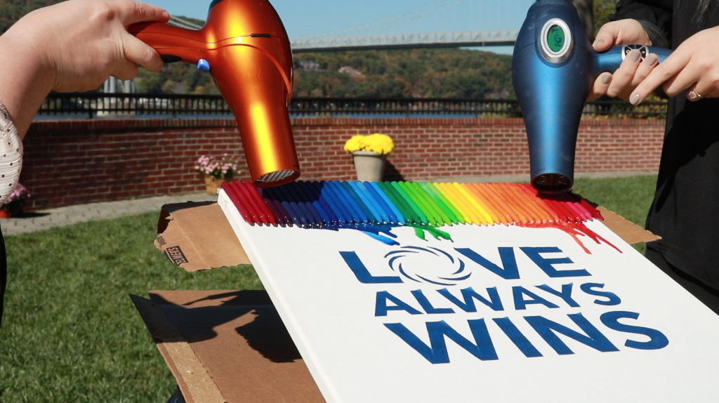 Melting Crayola crayons to make our #LOVEALWAYSWINS sign at The Grandview in Poughkeepsie NY overlooking the Hudson River in October